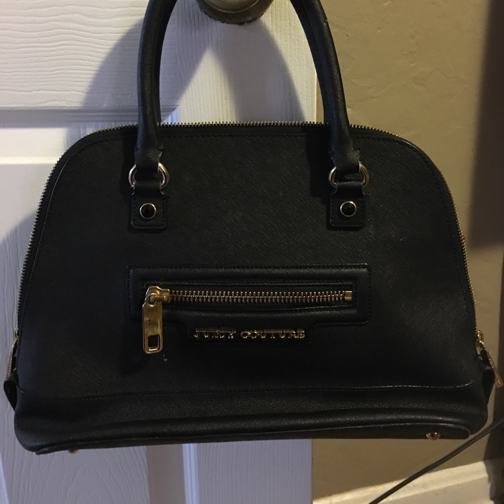 A juicy couture hand bag.